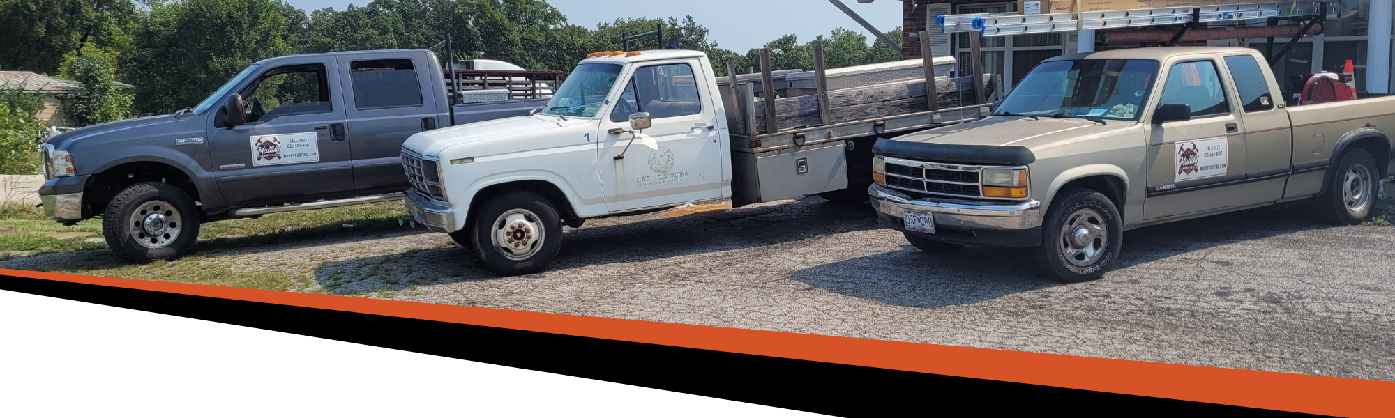 Maddy Roofing company trucks